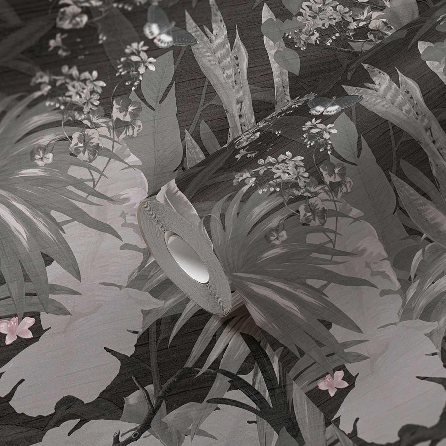 Gray-scale illustration of a butterfly among tropical leaves and flowers