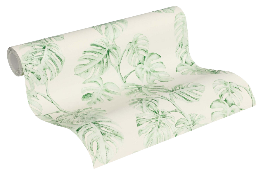 Roll of wallpaper with green leaf pattern on a cream background